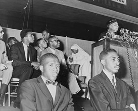 Elijah Muhammad addresses followers including Cassius Clay.1964.