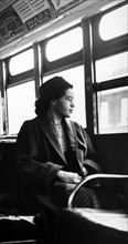 Rosa Parks sitting on a bus in Montgomery, Alabama, 1956.