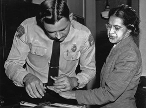 Rosa Parks is fingerprinted by police Lt. D.H. Lackey in Montgomery 1956.