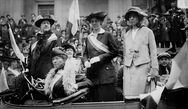 Alice Paul, Doris Stevensand other Suffragists in a Car during a  Parade.