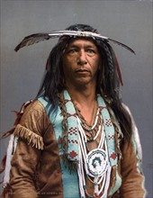 Arrow maker, an Ojibwa brave c1903.