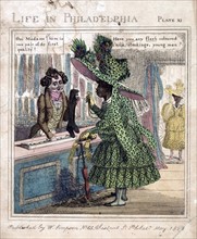 Print shows an African American woman, wearing a very large hat