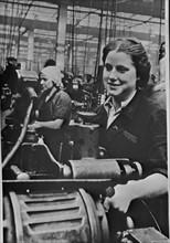 Women handling lathe in a factory in the USSR, 1940