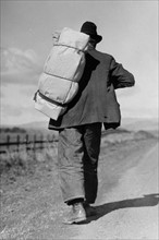 Migrant worker on California highway, 1938