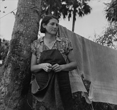 Wife of packinghouse worker, migrant from Missouri said We have never lived like hogs before but we sure does now, it's no different from hog livvin. Canal Point, Florida 19390101.