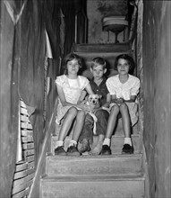 Children of migrant citrus worker who lives in a rundown apartment house. Florida 19370101