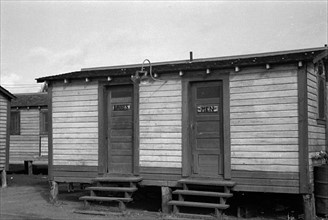 Toilets in the tourist camp for migrant agricultural workers near Belle Glade, Florida 19370101