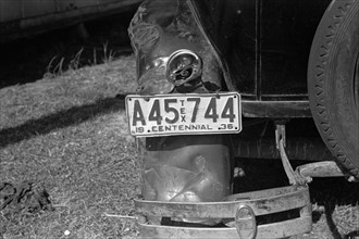 The battered rear of a migrant citrus worker's car. Winter Haven, Florida 19370101