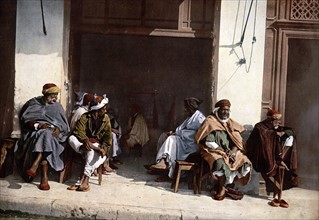 Arabs before a cafe, Algiers, Algeria 1899.