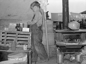 Son of former labour contractor, now a migrant worker. Weslaco, Texas 19390101