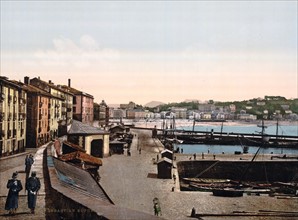 Colour photomechanical print of the Sans Sebastián harbour