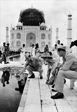 Photograph of Corporal Anthony J. Scopelliti, Private First Class Ray Cherry and Private First Class John C. Byron, Jr. outside the Taj Mahal