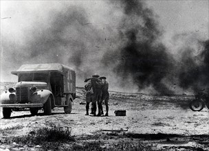 Photographic print of an enemy attack on a ambulance desert convoy