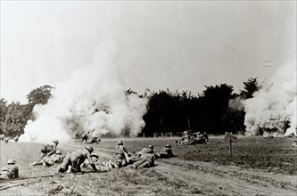 Photograph of the 326th Infantry, 82nd Division, advancing on enemy positions in Choloy, France. 1918