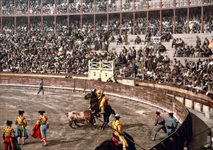 Hand-Coloured photograph of bullfighting in Barcelona