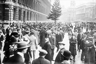 Announcement of World War One commencement as a crowd gathers near Downing St., London 1914