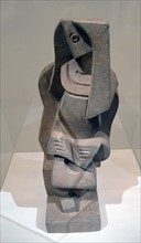 Sculpture titled 'Personnage assis lisant' by Jacques Lipchitz