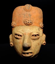 Olmec figurine, made from terracotta. From Mexico or Guatemala. 1500-600 BC