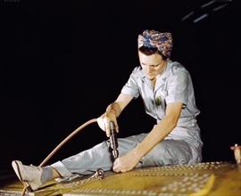Drilling on a Liberator Bomber, Consolidated Aircraft Corp., Fort Worth, Texas.