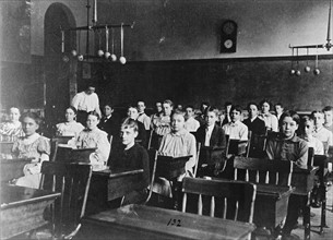 Boys and girls seated at desks in Washington, D.C. classroom 1899