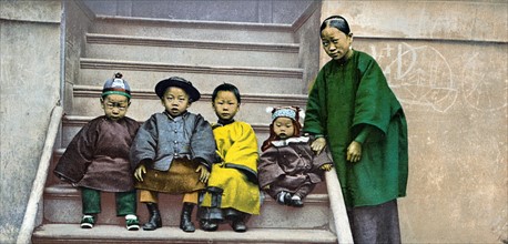Photomechanical print of a Chinese family in America