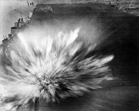 World War Two : A Japanese bomb explodes on the flight deck of Enterprise on 24 August 1942