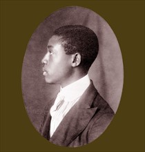 African American man, head-and-shoulders portrait, left profile. Types of American Negroes, compiled and prepared by W.E.B. Du Bois.