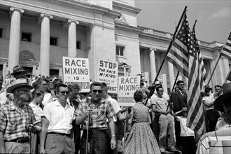 White segregationist demonstrators protesting at the admission of the Little Rock Nine, to Central High School; 1959.