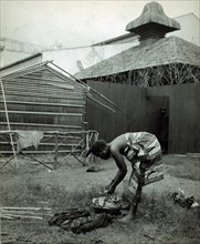 African woman washing clothes at the Pan-American Exposition, Buffalo, N.Y