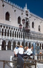 Post world war two: Unemployed gondoliers Doge's Palace, Venice; Italy 1945
