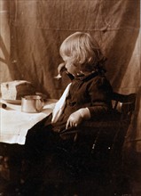 Child having bread & milk, 1890. By Frances Stebbins Allen, 1854-1941, photographer