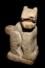 Mayan stone door post in the form of a seated jaguar; from Chichen Itza