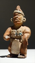 Mayan ceramic figure representing a dwarf.