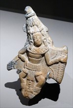 ceramic figurine of a Mayan dancer