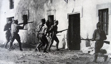Nationalist Troops search homes in the town of Irun