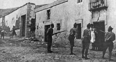 Nationalist Troops search homes in the town of Irun