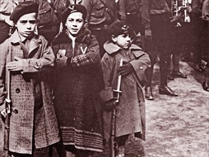 Young boys dressed as Falangist militia, during the Spanish Civil War.