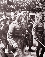Nationalist soldiers enter Burgos, Spain, during the Spanish Civil War