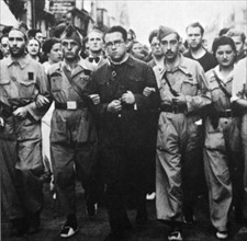Santiago José Carrillo leads a militia march during the Spanish Civil War