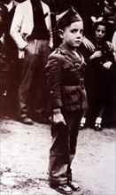 boy wearing a nationalist uniform, during the Spanish Civil War