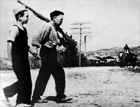 boy drilled for military action, during the Spanish Civil War