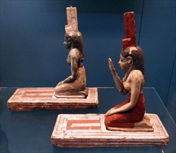 Painted wooden statuettes of Isis and Nephthys
