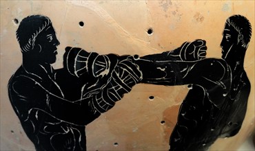 Black-figured Panathenaic amphora, showing a boxing contest. Greek