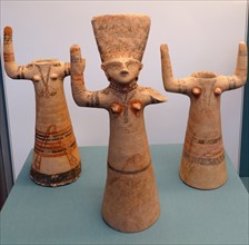 Terracotta ‘Great Goddess’ of Cyprus depicted with upraised arms
