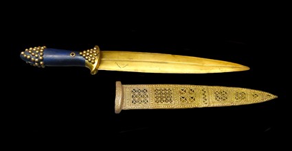 Electrotype copy of a gold ceremonial dagger with sheath. Sumerian