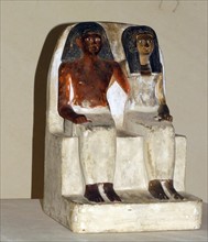 Painted limestone statue of an unnamed man and his wife from a tomb-chapel at Thebes, 18th Dynasty about 1350 BC.