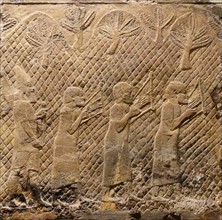 Prisoners playing lyres. Assyrian, about 700-692 BC From Nineveh