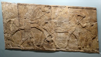 Relief depicting Courtiers watching lion hunts Assyrian, about 645-635 BC From Nineveh, North Palace. Assyrian, about 645-635 BC