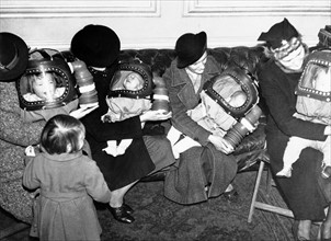 Gas masks for babies, in England, during World war two; 1940