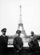 German Chancellor Adolf Hitler, with architect, Albert Speer and sculptor, Arno Breker (right), arrive in Paris